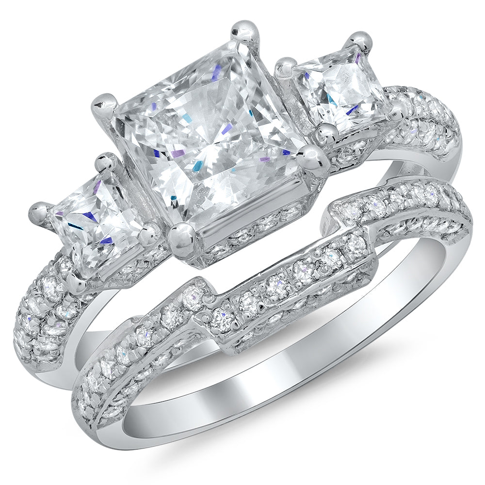 Ladies White Gold Diamond Ring  with 1.00ct in center and 64 round diamond on side. And matching White Gold Band.
