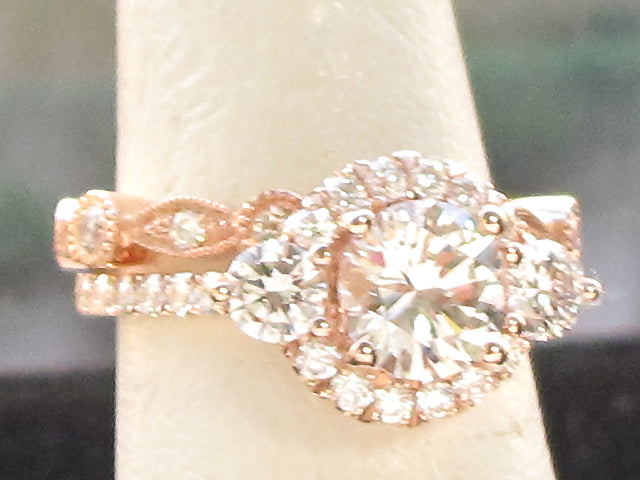Ladies 14k Rose Gold Diamond Engagement Ring  along with wedding Band.